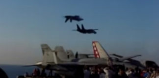 Inverted F/A-18 On Top Of F-14 Aircraft Carrier Flyby